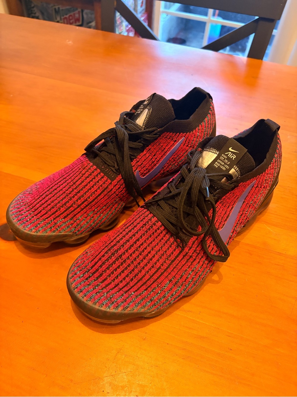 Nike Athletic Flyknit Socks-Style Shoes in Red and Black with Purple Swoosh